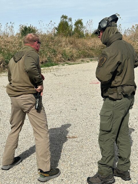 Two people eat the shooting range