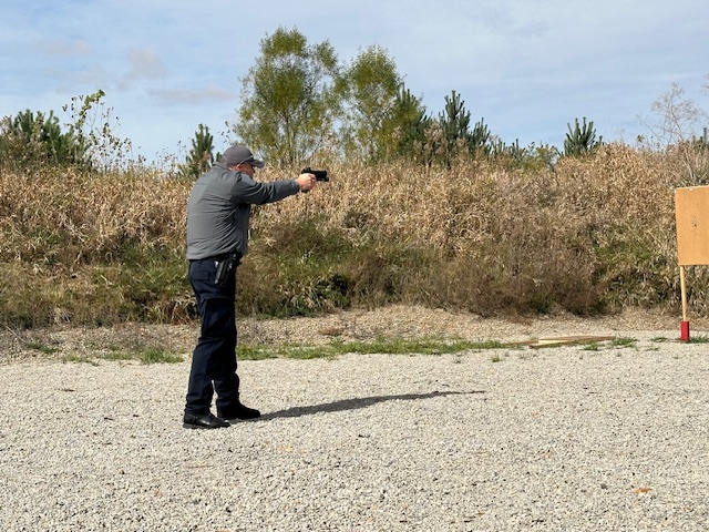 person shooting a gun
